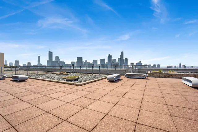 a view of a terrace with chairs