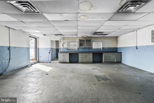 a view of street with parked cars