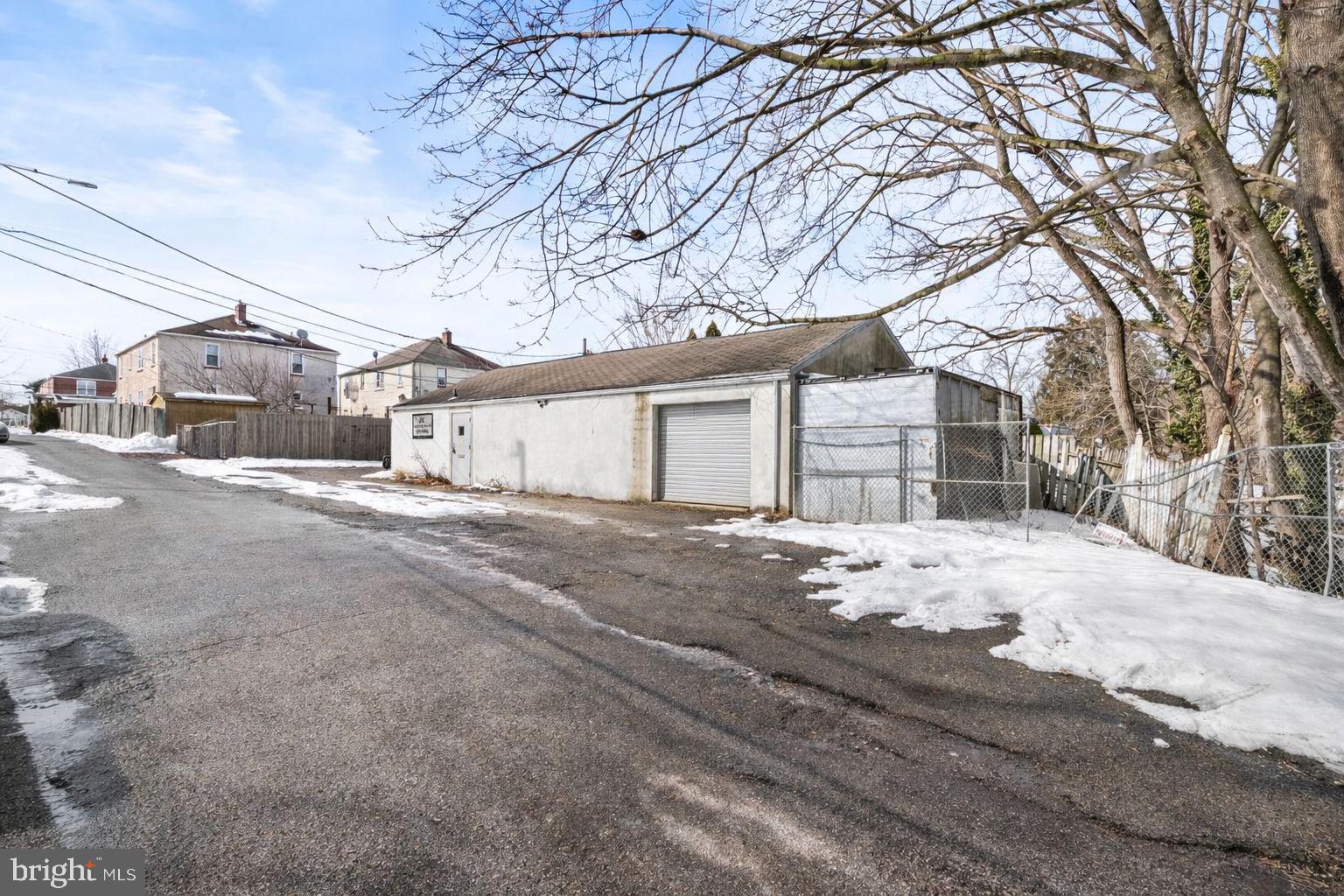 1013 Rapp Alley Norristown, PA 19401 - Photo 3 of 23 a view of a house with snow on the road