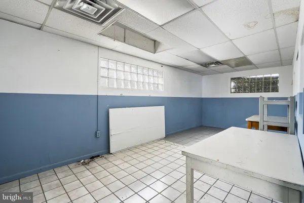 a kitchen with stainless steel appliances a cabinets and counter space