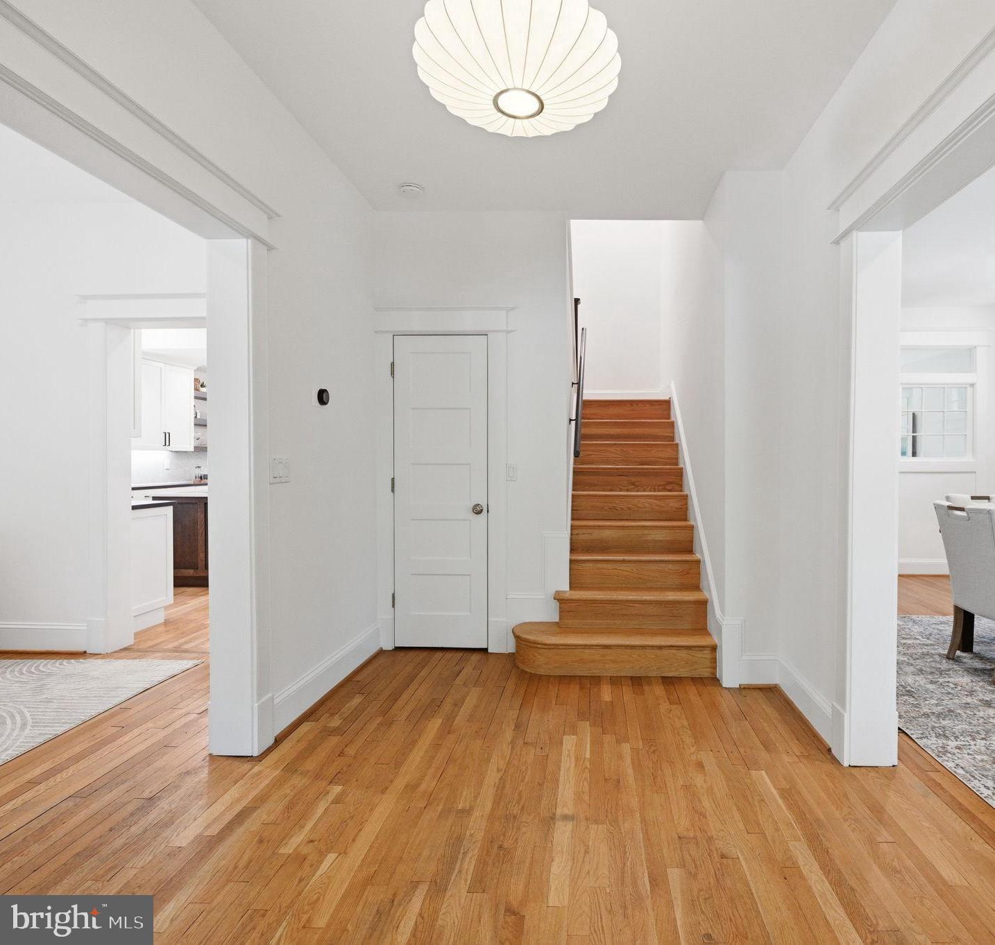 3707 Military Road Northwest Washington, DC 20015 - Photo 2 of 60 an empty room with wooden floor and windows
