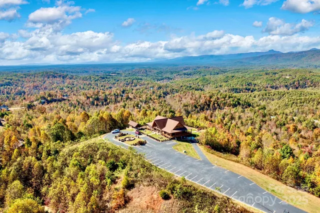 a aerial view of a house with a big yard