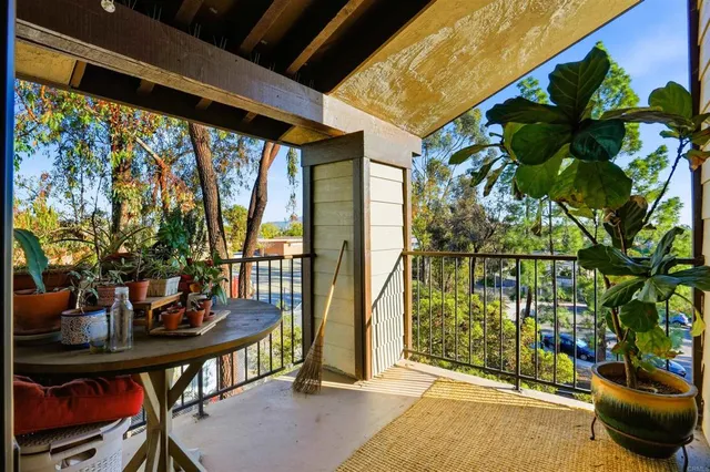 a view of a furniture room with wooden floor
