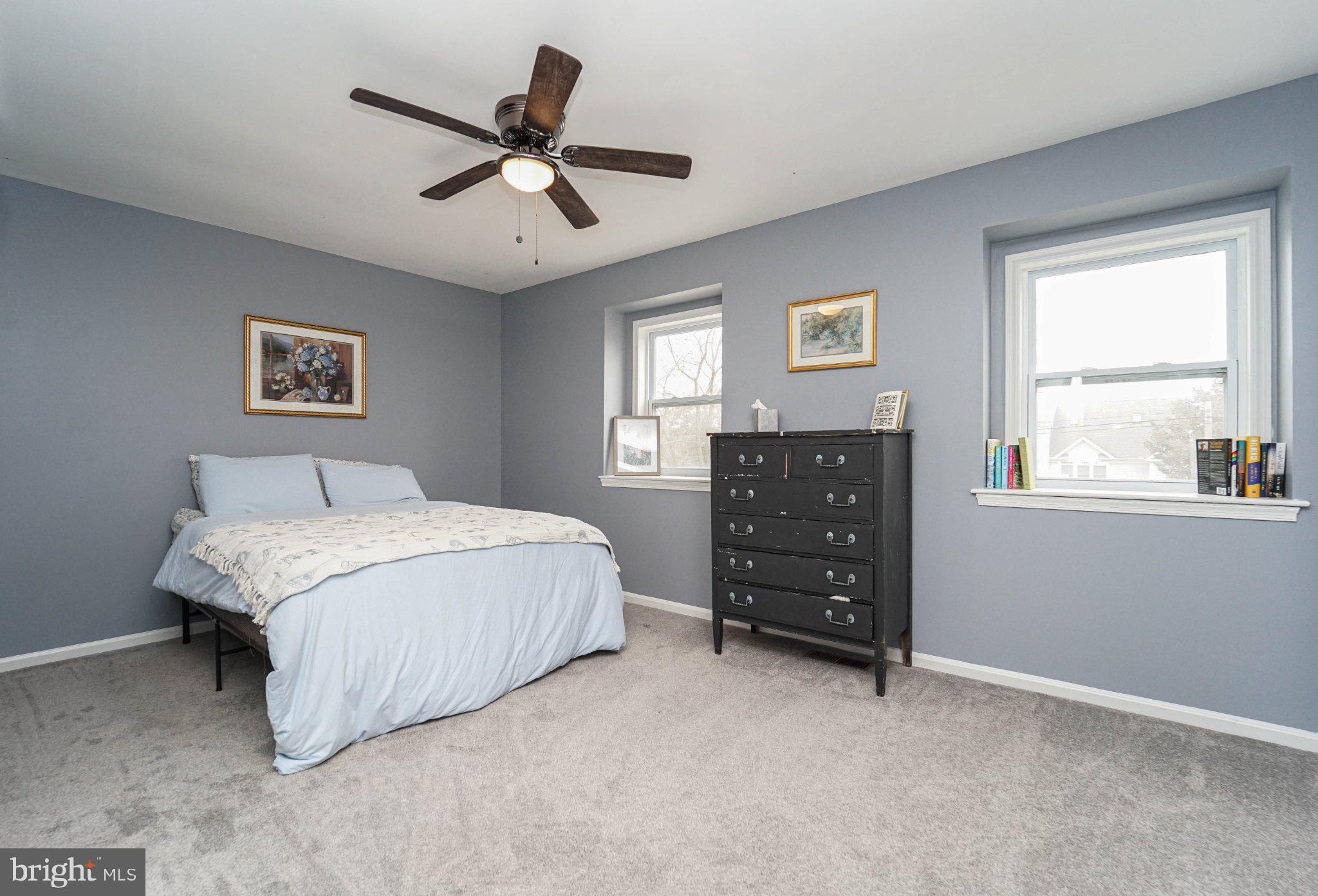 211 Queen Anne Road Stevensville, MD 21666 - Photo 21 of 33 Serene bedroom with soft hues.