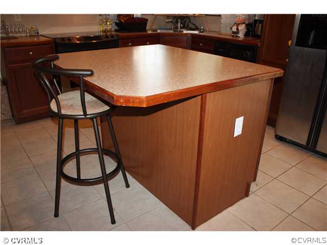 7307 Drexelbrook Road Chesterfield, VA 23832 - Photo 5 of 10 a view of table and chairs in the kitchen