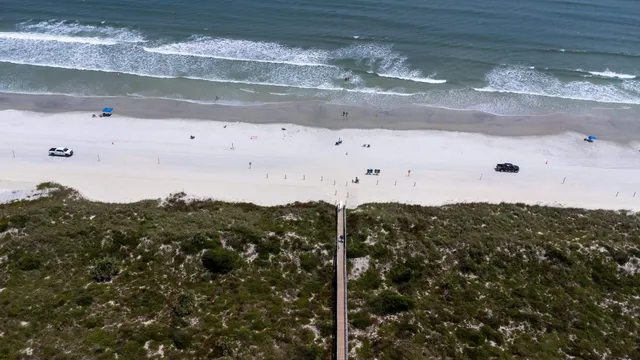 a view of a field with a small yard