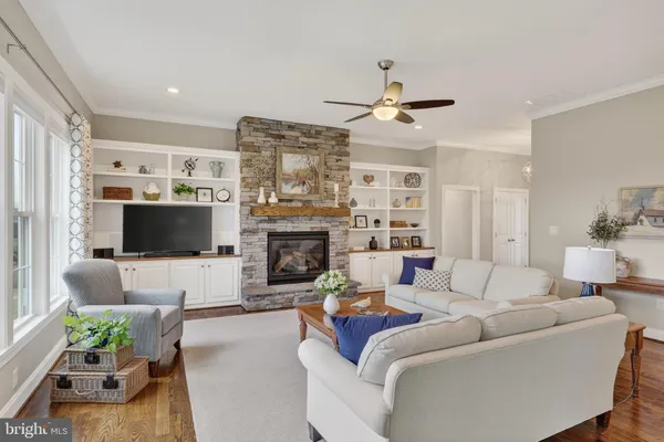a bedroom with two beds and a chandelier