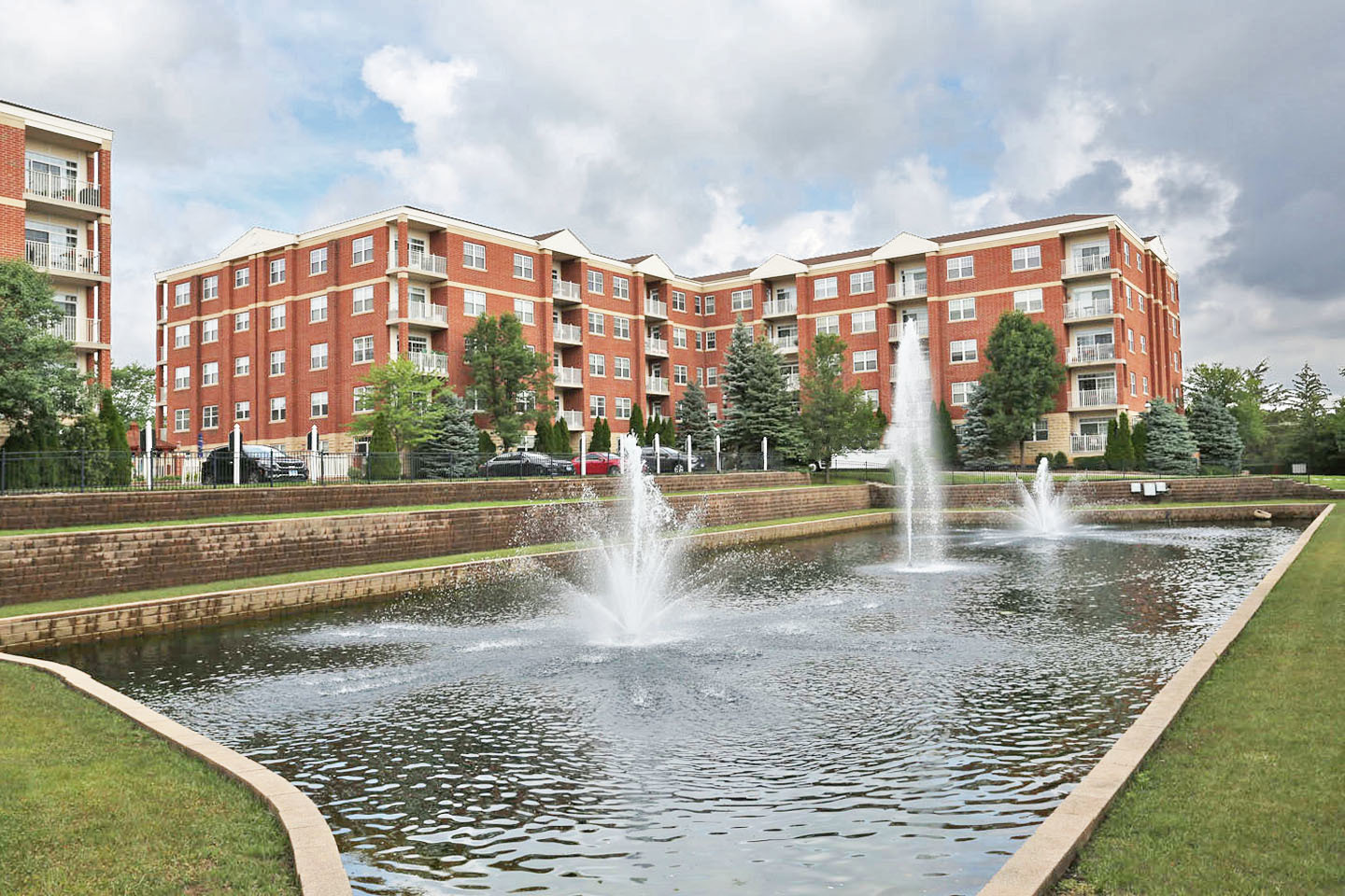 a view of building with swimming pool and sitting space