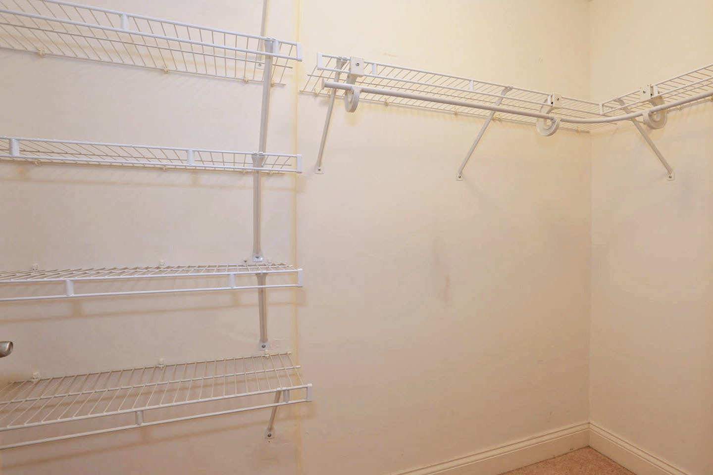 1 Itasca Place, Unit 304 Addison, IL 60143 - Photo 13 of 25 a view of a room with racks on the wall