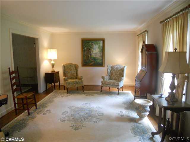 8100 Sinclair Road Mechanicsville, VA 23111 - Photo 4 of 12 Living Room - Sunny living room with wood flooring