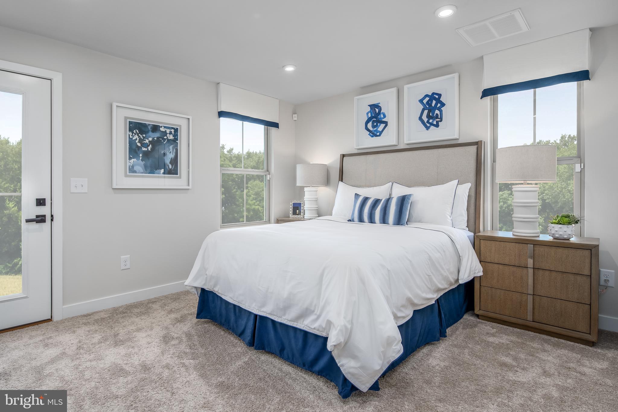 7928 Brandy Station Road, Unit SERENADE Hanover, MD 21076 - Photo 14 of 26 a bedroom with a bed and window