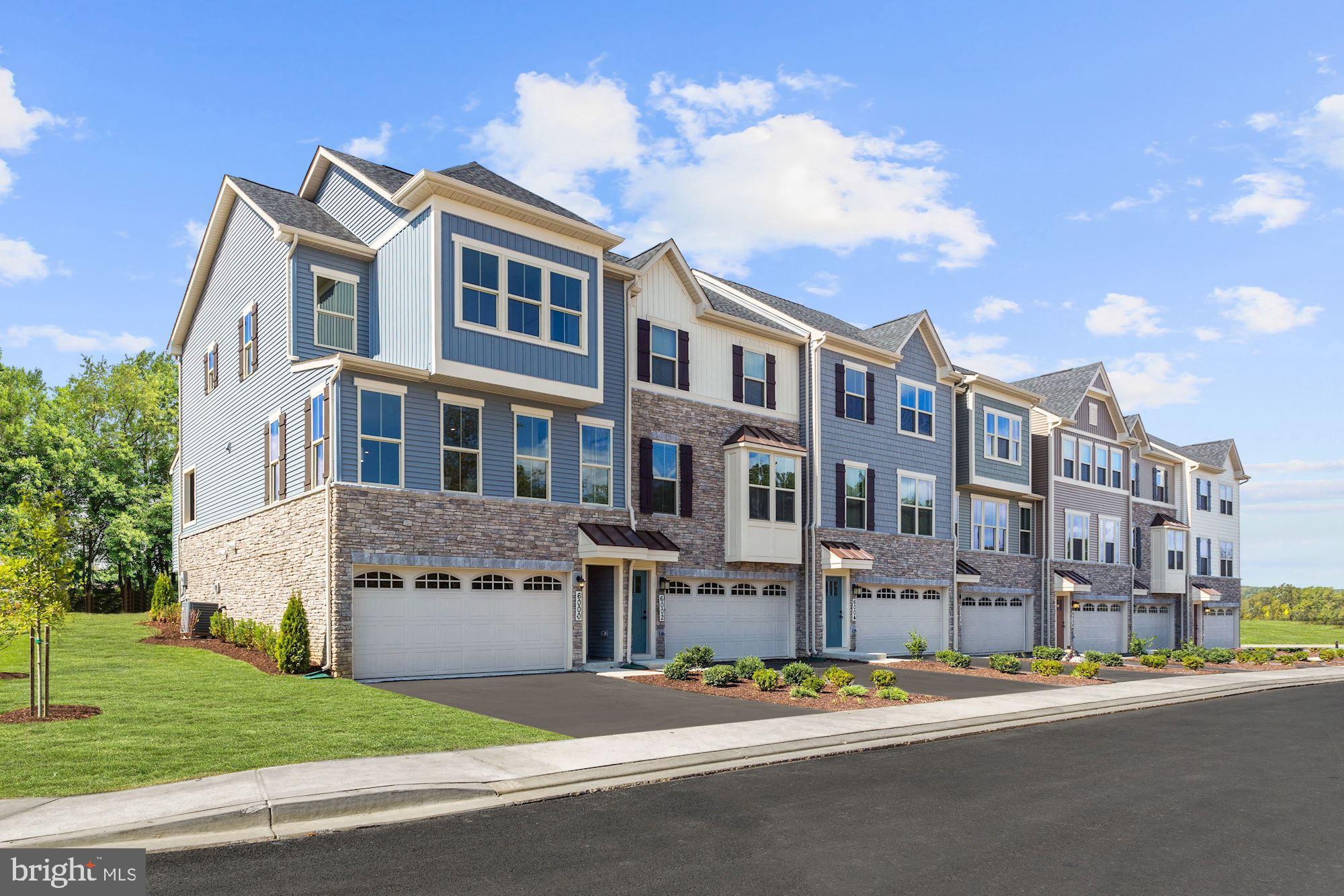 7928 Brandy Station Road, Unit SERENADE Hanover, MD 21076 - Photo 2 of 26 a view of a building with a street