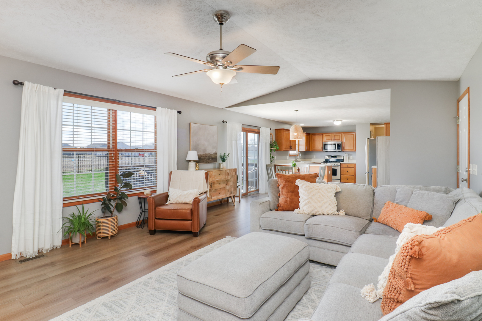 1820 Chuck Murray Drive Normal, IL 61761 - Photo 11 of 46 a living room with furniture and a large window