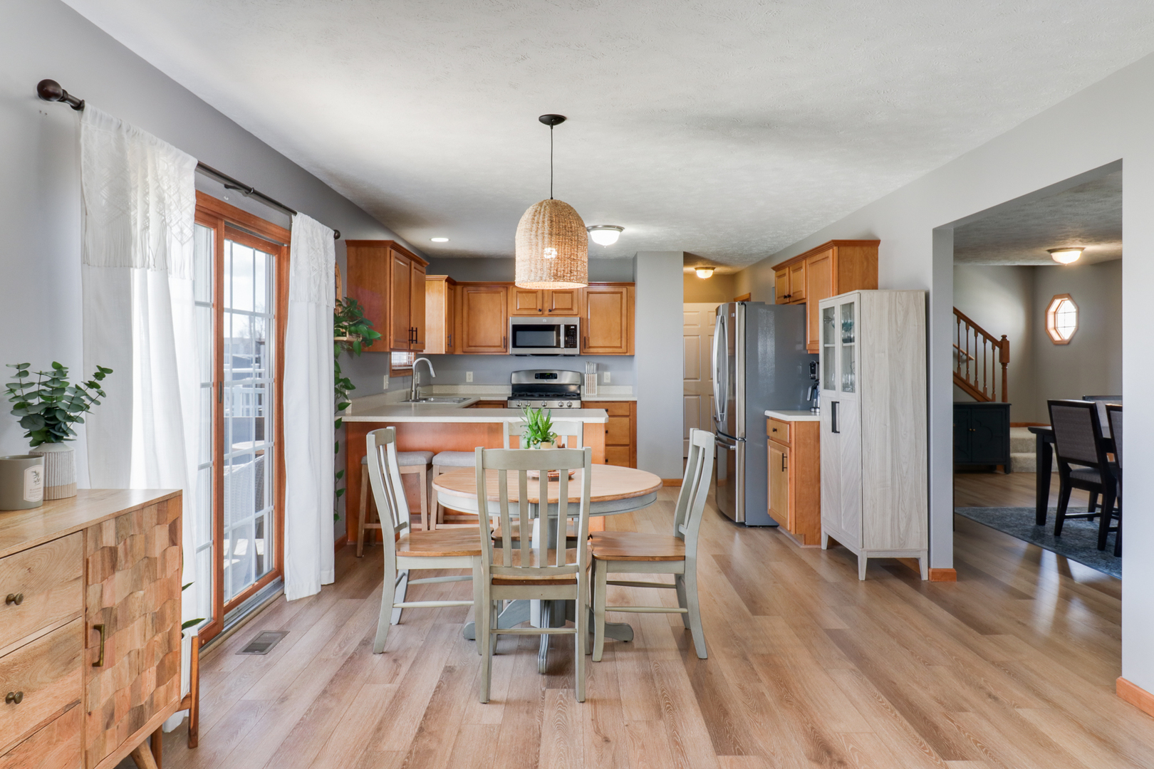 1820 Chuck Murray Drive Normal, IL 61761 - Photo 12 of 46 a dining room filled with furniture and wooden floor