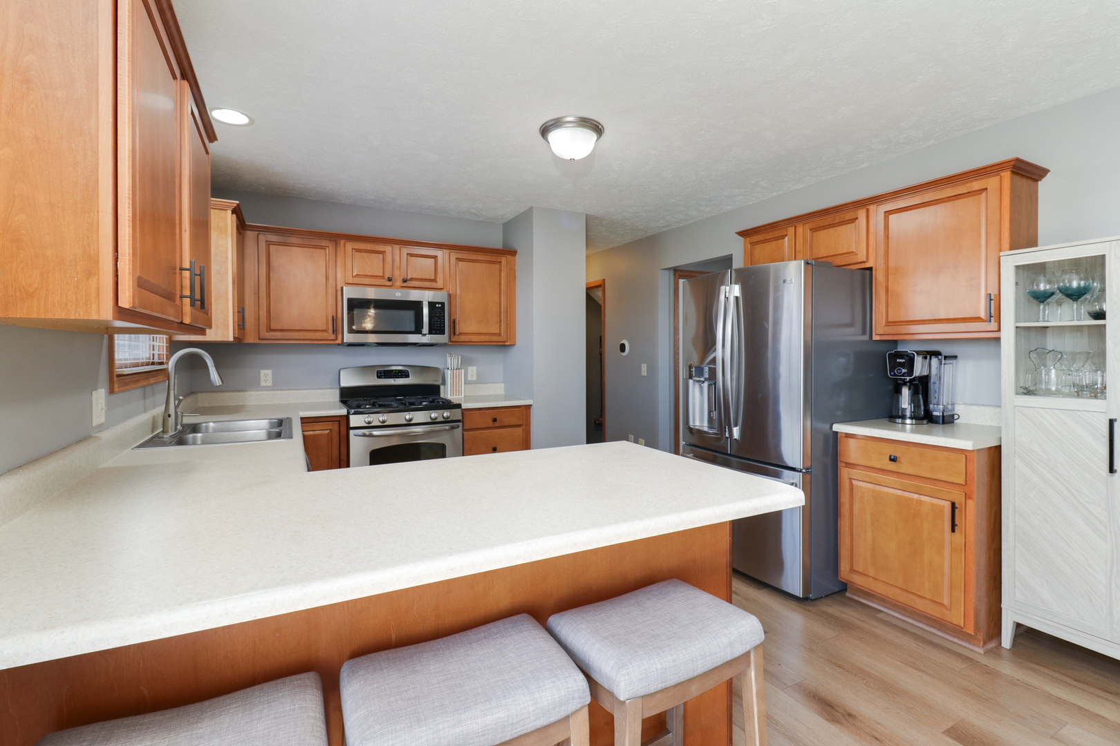 1820 Chuck Murray Drive Normal, IL 61761 - Photo 16 of 46 a kitchen with stainless steel appliances a refrigerator sink and stove