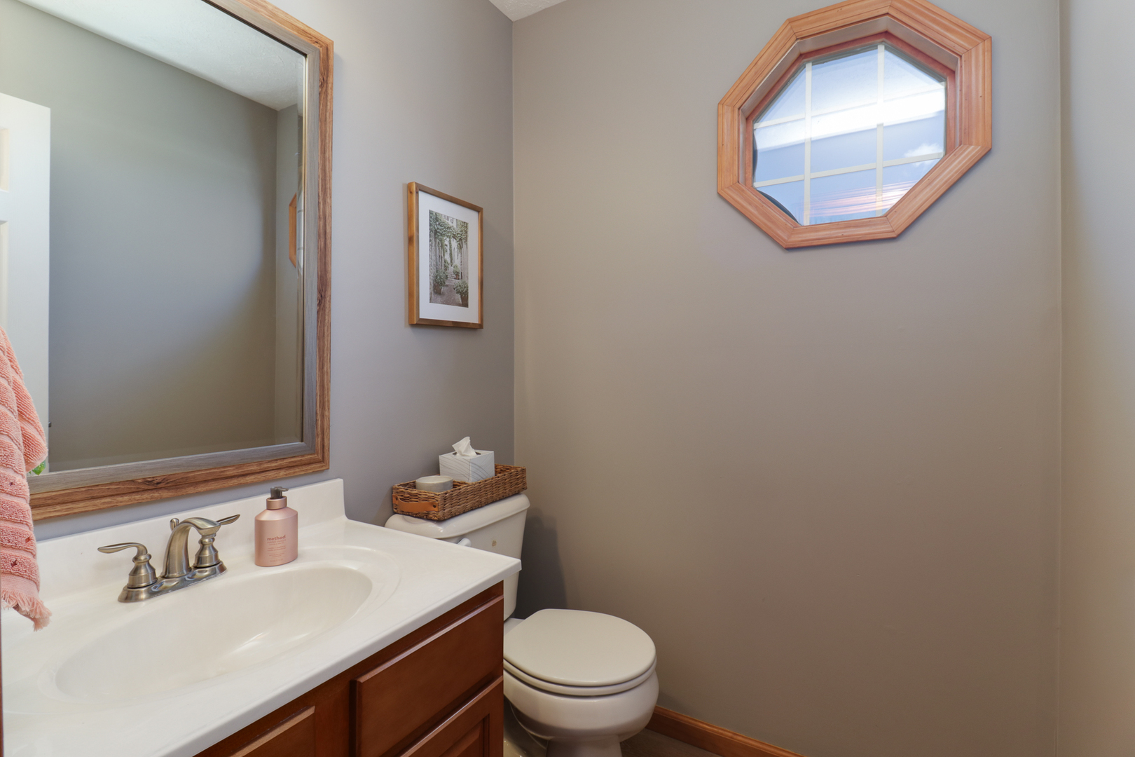 1820 Chuck Murray Drive Normal, IL 61761 - Photo 20 of 46 a bathroom with a sink a toilet and mirror