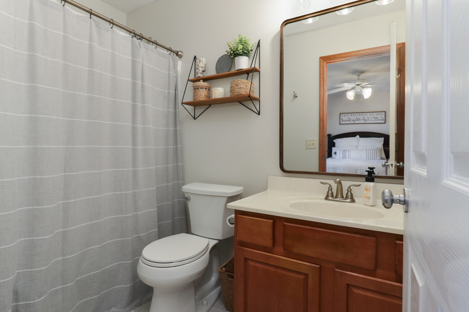 1820 Chuck Murray Drive Normal, IL 61761 - Photo 24 of 46 a bathroom with a toilet sink and mirror