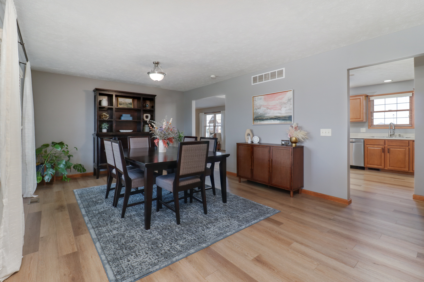 1820 Chuck Murray Drive Normal, IL 61761 - Photo 3 of 46 a view of a dining room with furniture and wooden floor