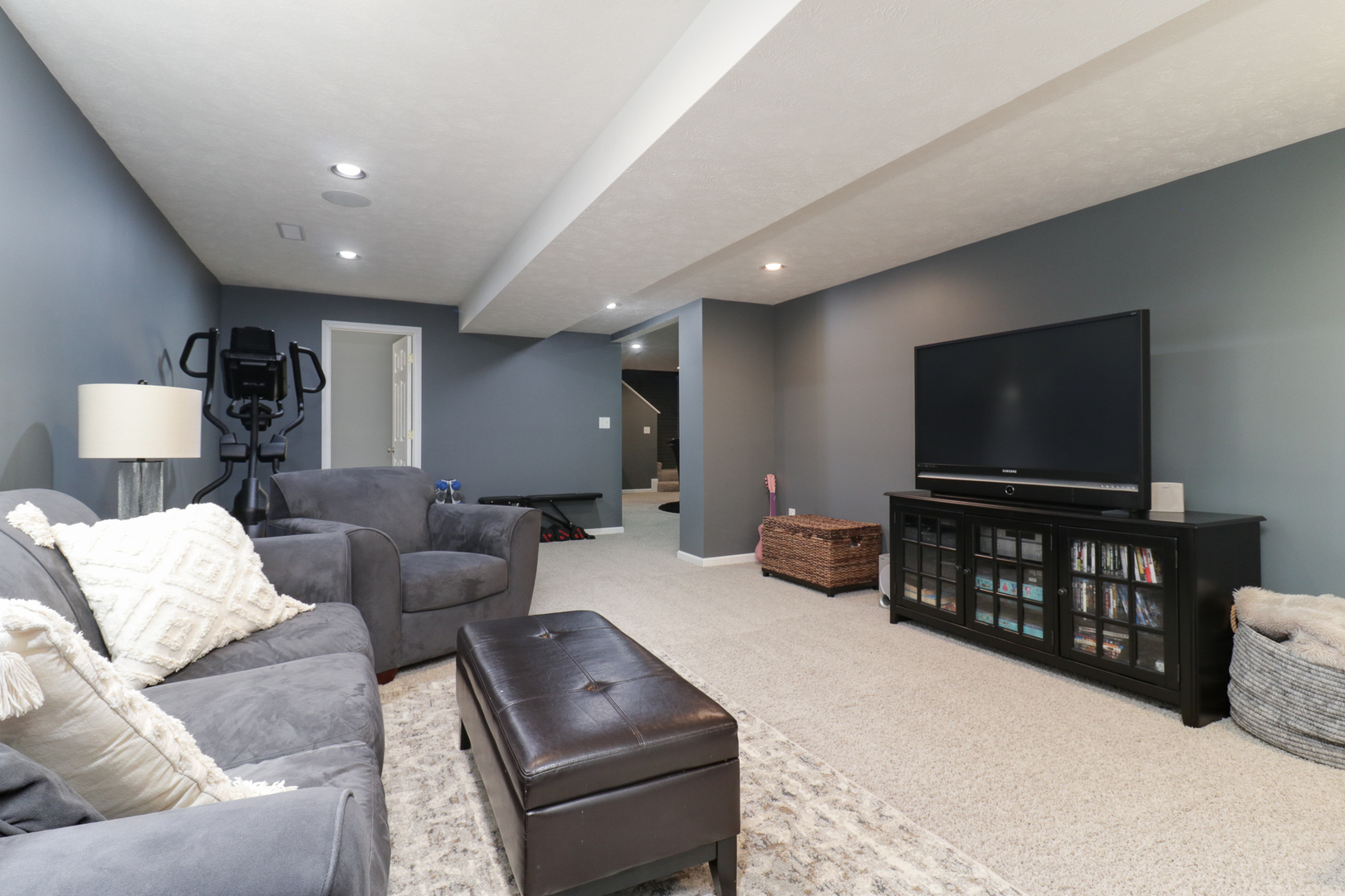 1820 Chuck Murray Drive Normal, IL 61761 - Photo 33 of 46 a living room with furniture and a flat screen tv
