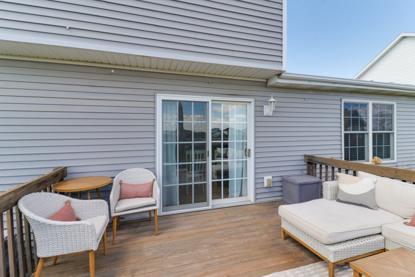 1820 Chuck Murray Drive Normal, IL 61761 - Photo 37 of 46 a view of a patio with couches chairs and wooden floor