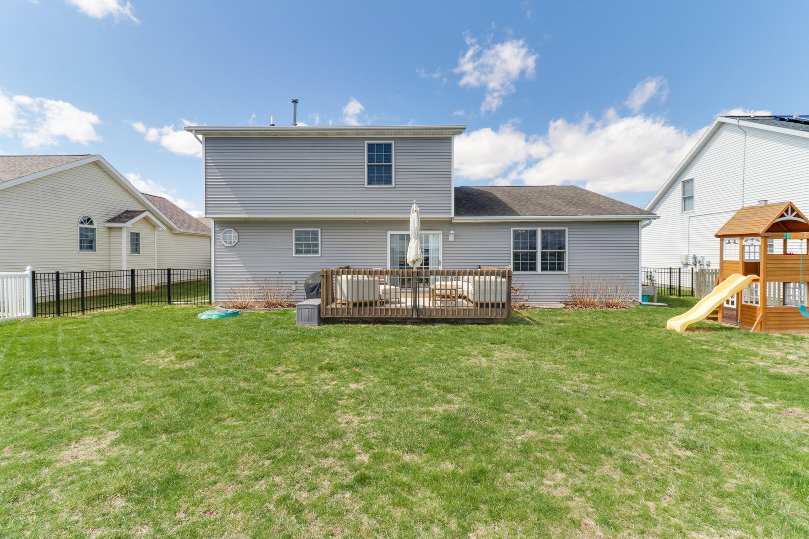 1820 Chuck Murray Drive Normal, IL 61761 - Photo 42 of 46 a view of a house with backyard porch and garden