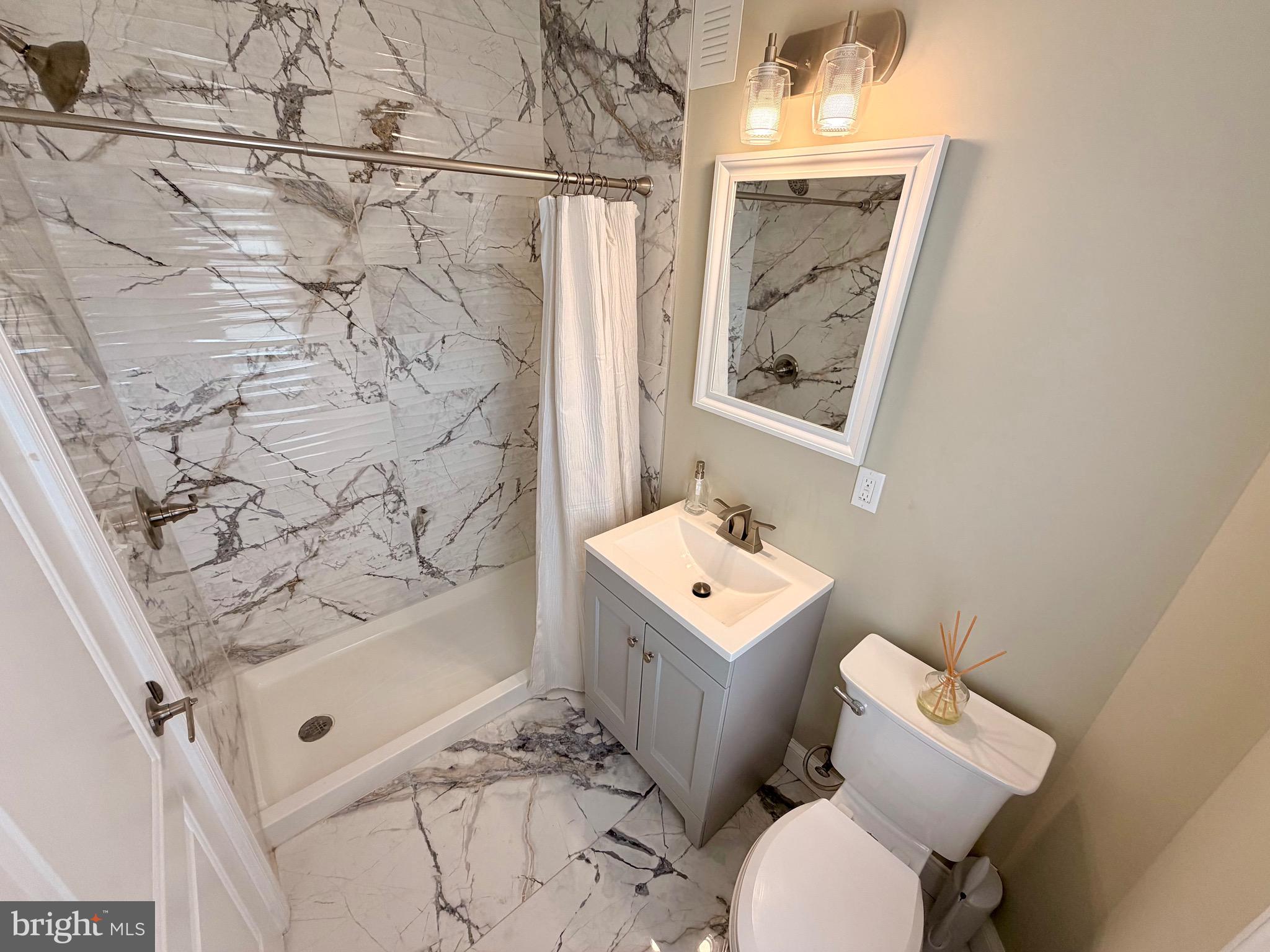 4053 Nottingham Way Hamilton, NJ 08690 - Photo 9 of 10 1st floor bathroom