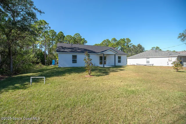 a house view with a swimming pool