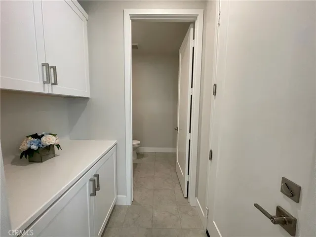 a view of storage utility and utility room