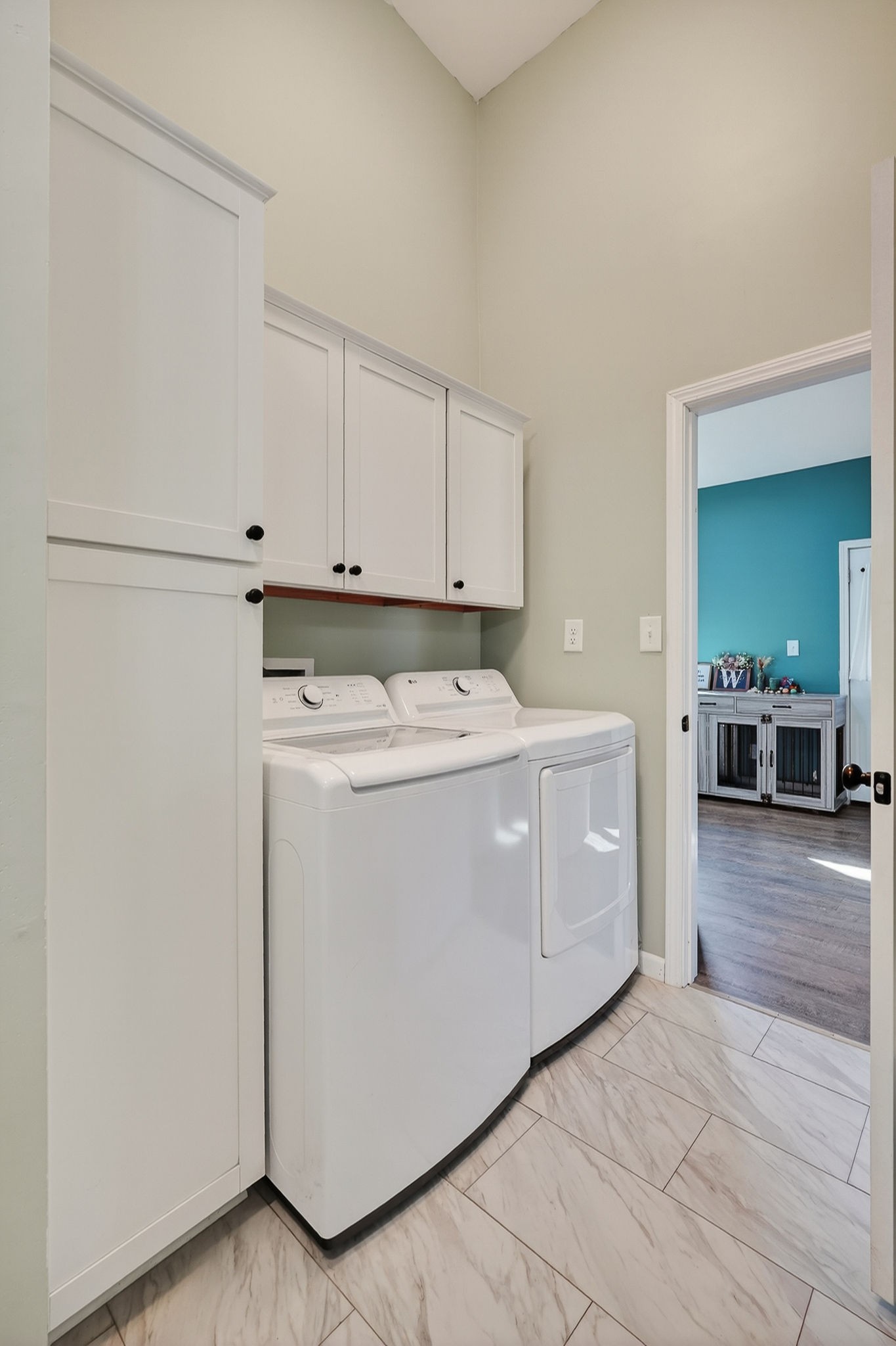 3820 Jefferson Road Smithville, TN 37166 - Photo 13 of 31 a utility room with cabinets washer and dryer