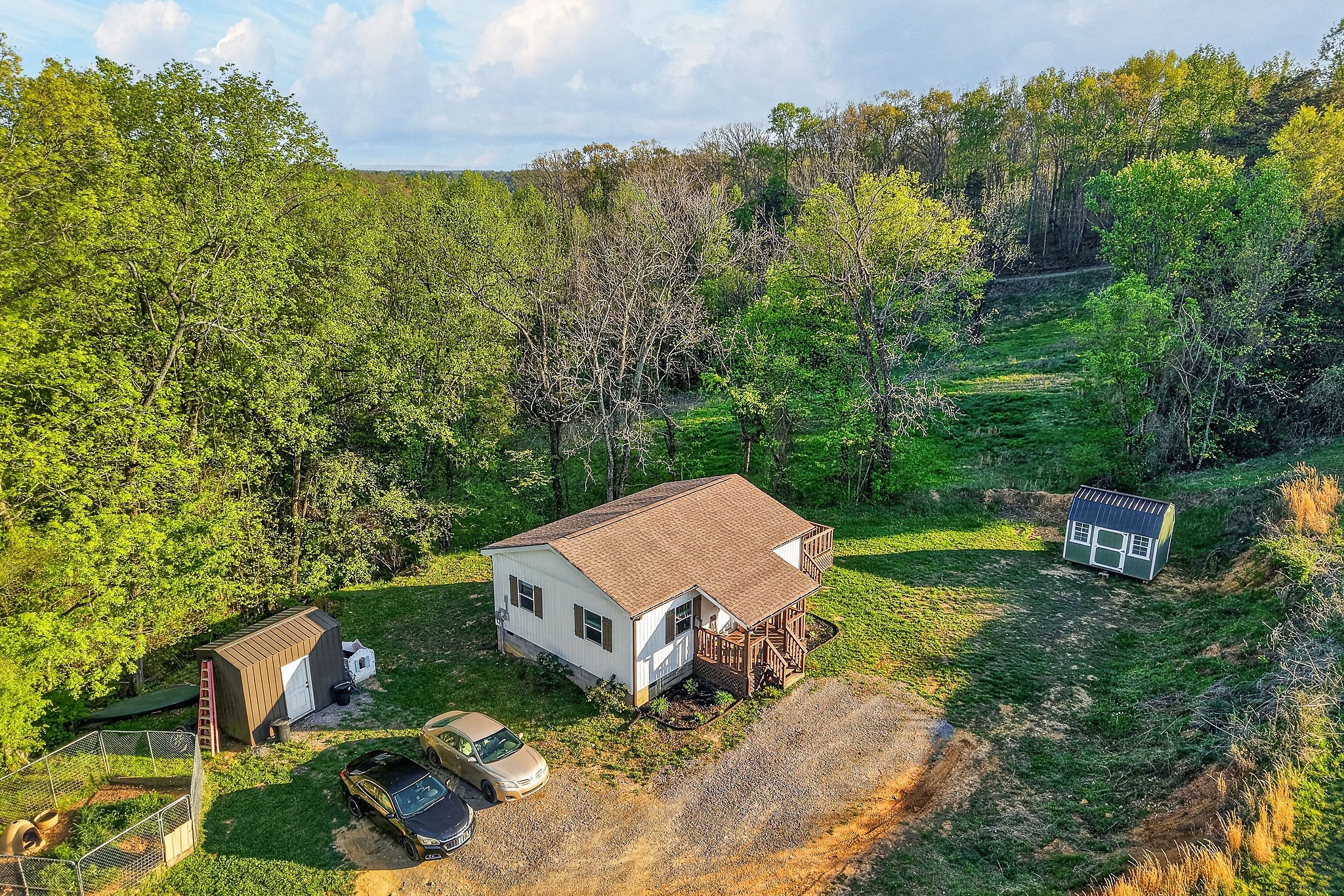 3820 Jefferson Road Smithville, TN 37166 - Photo 25 of 31 an aerial view of a house with yard and outdoor seating