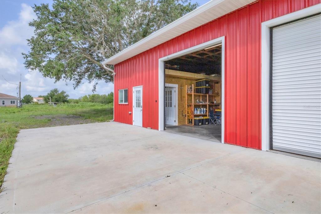 3045 Logue Road Myakka City, FL 34251 - Photo 15 of 31 a view of a house with backyard and porch