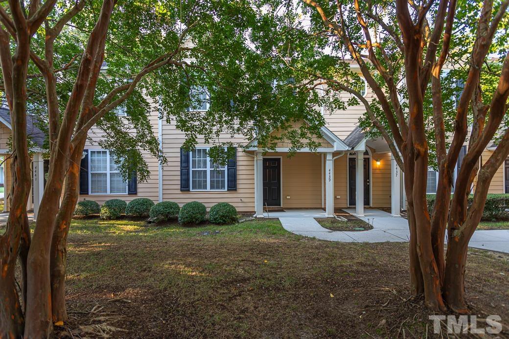 4439 Moss Garden Path Raleigh, NC 27616 - Photo 2 of 30 a front view of a house with garden