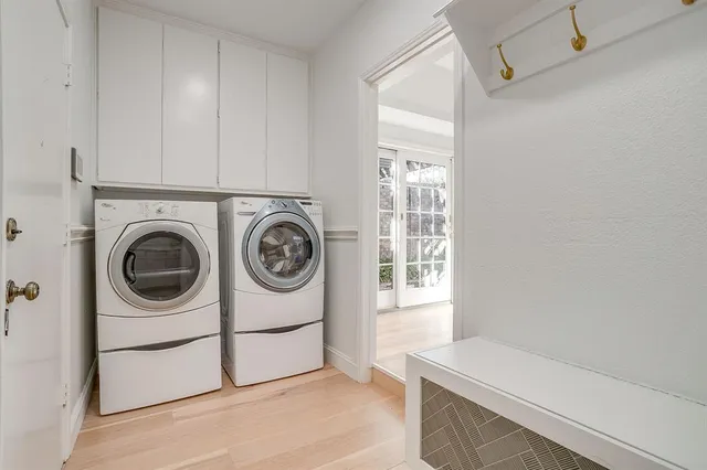 a utility room with dryer and washer
