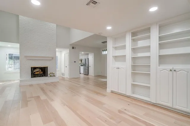a view of a livingroom with a fireplace
