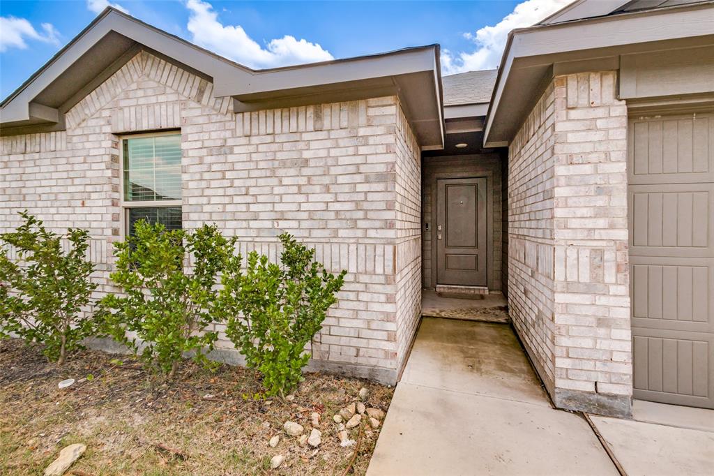 621 Spaulding Street Justin, TX 76247 - Photo 2 of 22 a view of entrance of the house
