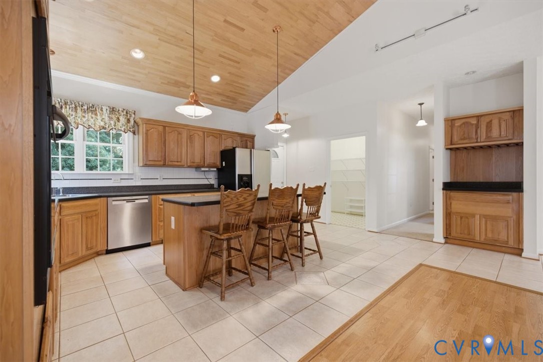 12600 Lilking Road Chester, VA 23831 - Photo 12 of 33 Spacious kitchen featuring wood cabinetry, stainle
