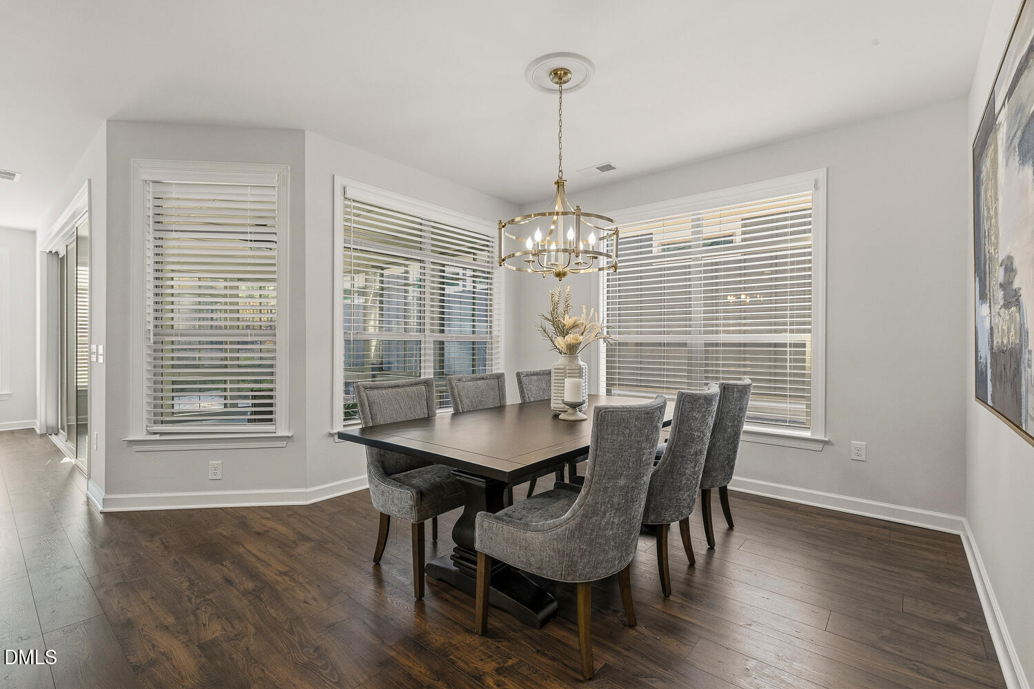 1345 Catlette Street Apex, NC 27523 - Photo 18 of 74 a view of a dining room with furniture window and wooden floor