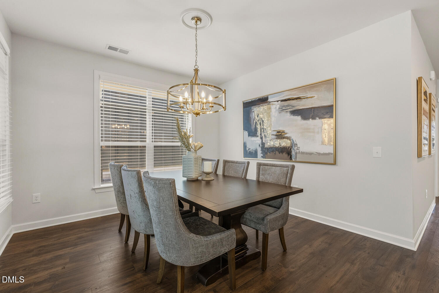 1345 Catlette Street Apex, NC 27523 - Photo 20 of 74 a view of a dining room with furniture window and wooden floor