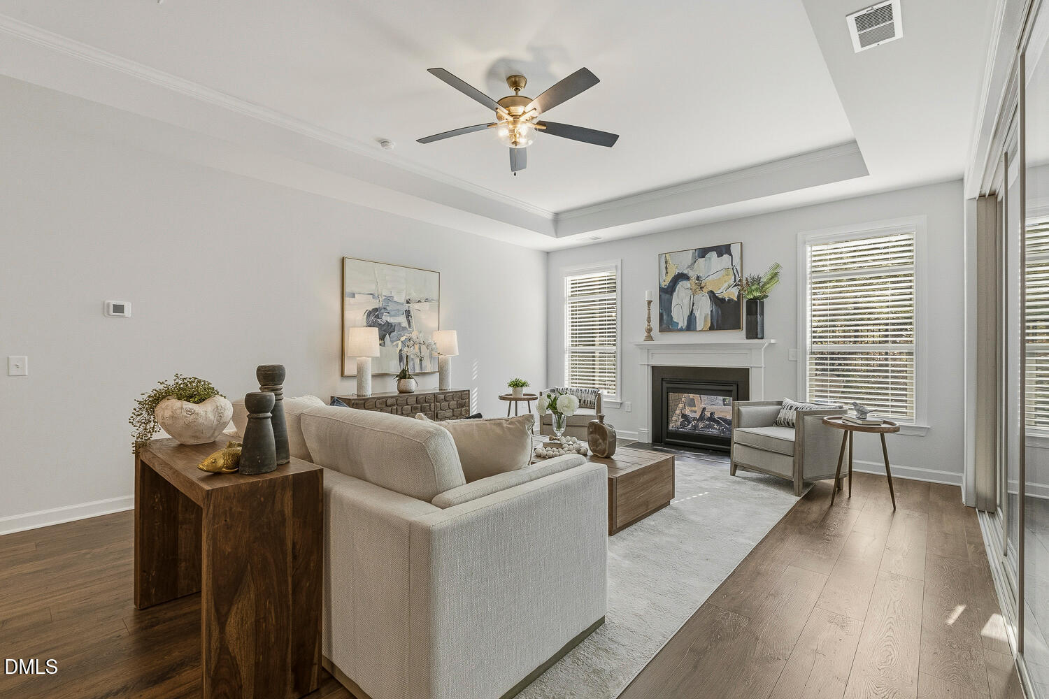 1345 Catlette Street Apex, NC 27523 - Photo 23 of 74 a living room with furniture a fireplace and a table