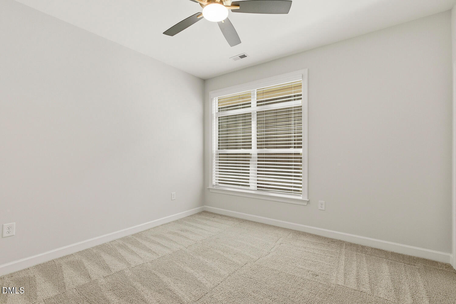 1345 Catlette Street Apex, NC 27523 - Photo 44 of 74 a view of an empty room with a window