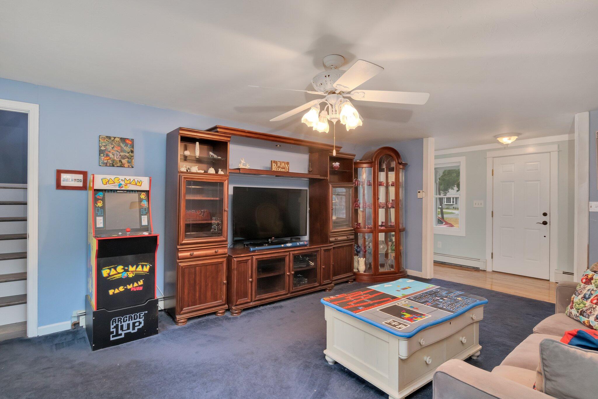 56 Mill Road East Sandwich, MA 02537 - Photo 28 of 63 a living room with furniture and a flat screen tv