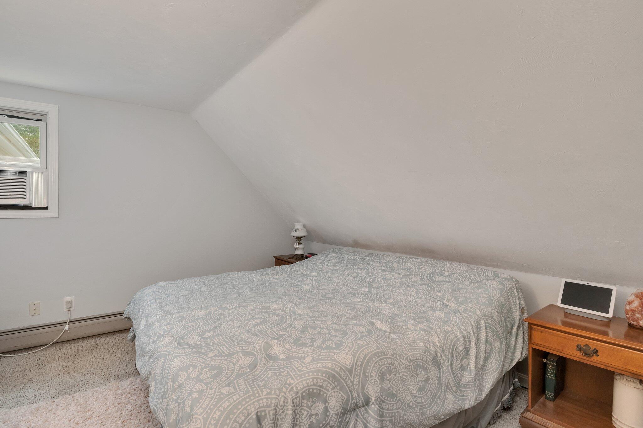 56 Mill Road East Sandwich, MA 02537 - Photo 37 of 63 a bedroom with a bed and a desk