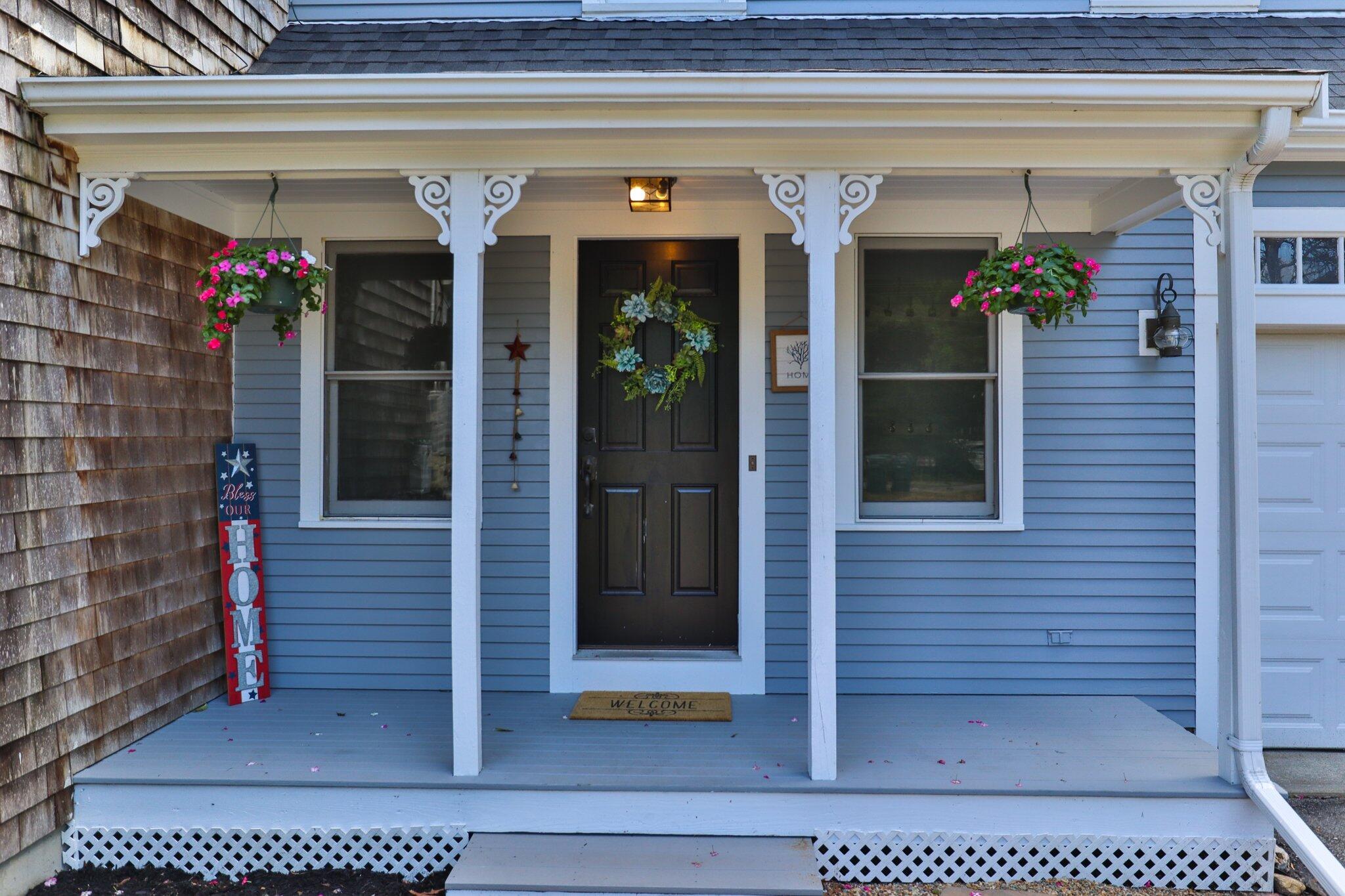 56 Mill Road East Sandwich, MA 02537 - Photo 4 of 63 a view of a entryway door front of house