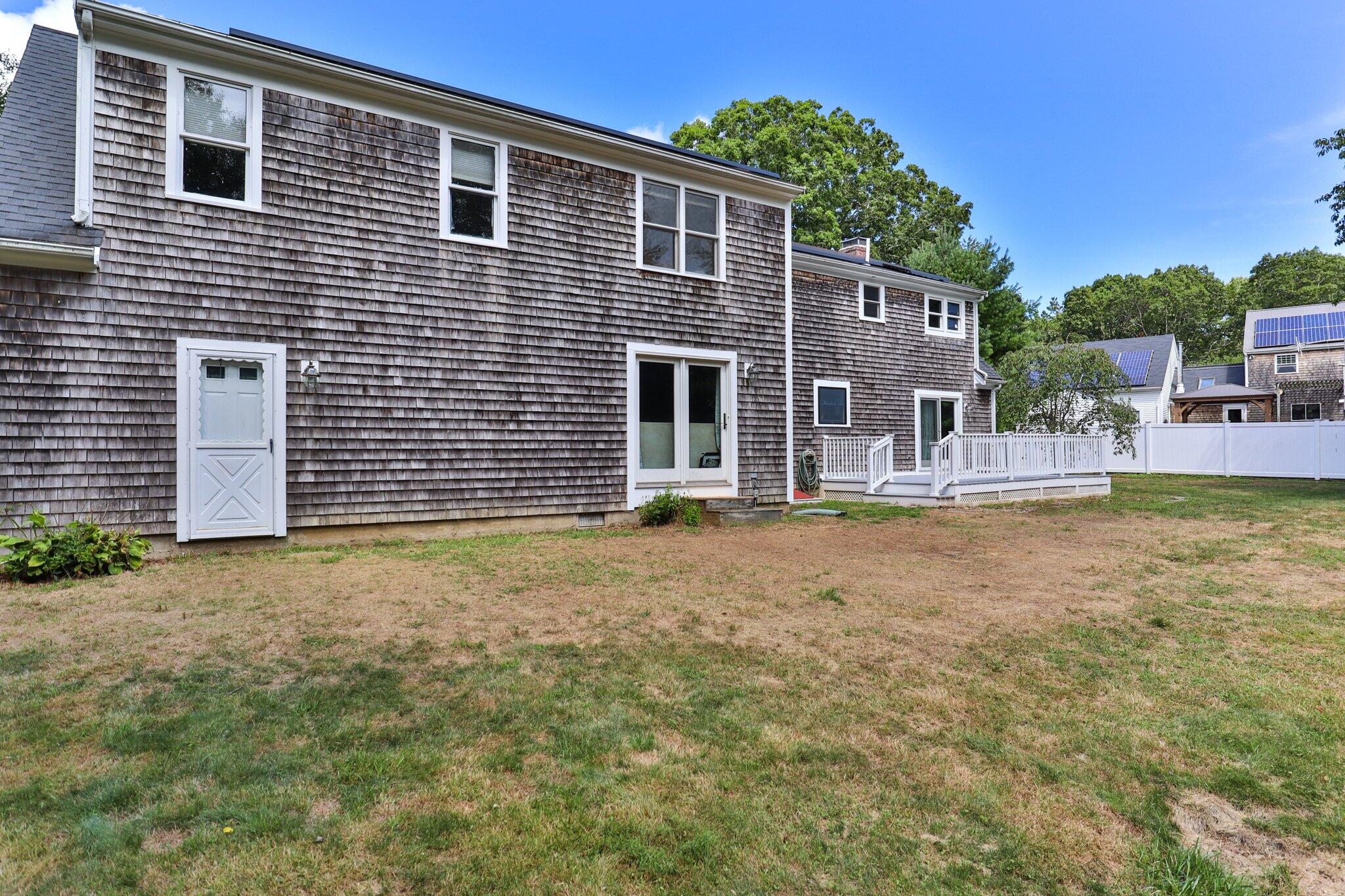 56 Mill Road East Sandwich, MA 02537 - Photo 48 of 63 a house view with a backyard space