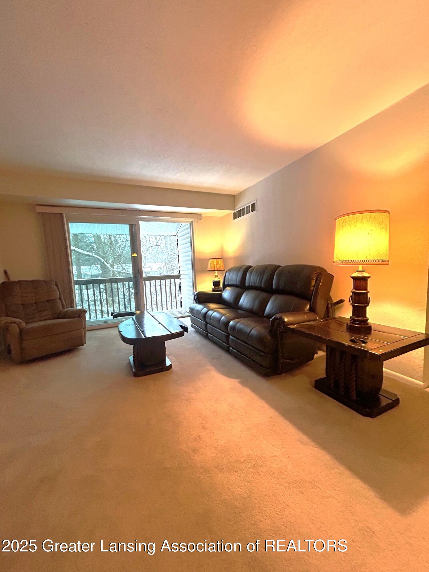 1717 Maple Ridge Road, Unit 49 Haslett, MI 48840 - Photo 2 of 23 Living room