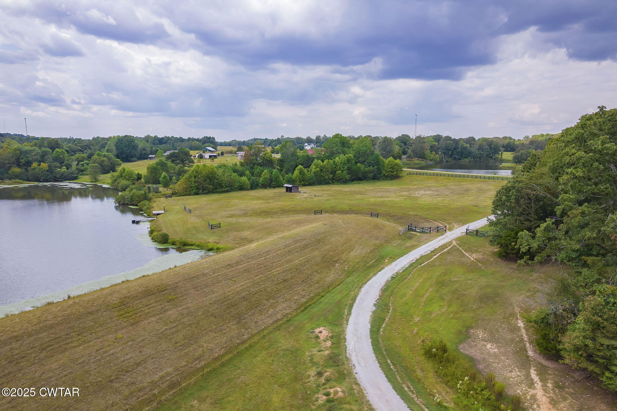 413 Law Lane Lexington, TN 38351 - Photo 12 of 25 a view of a lake from a yard