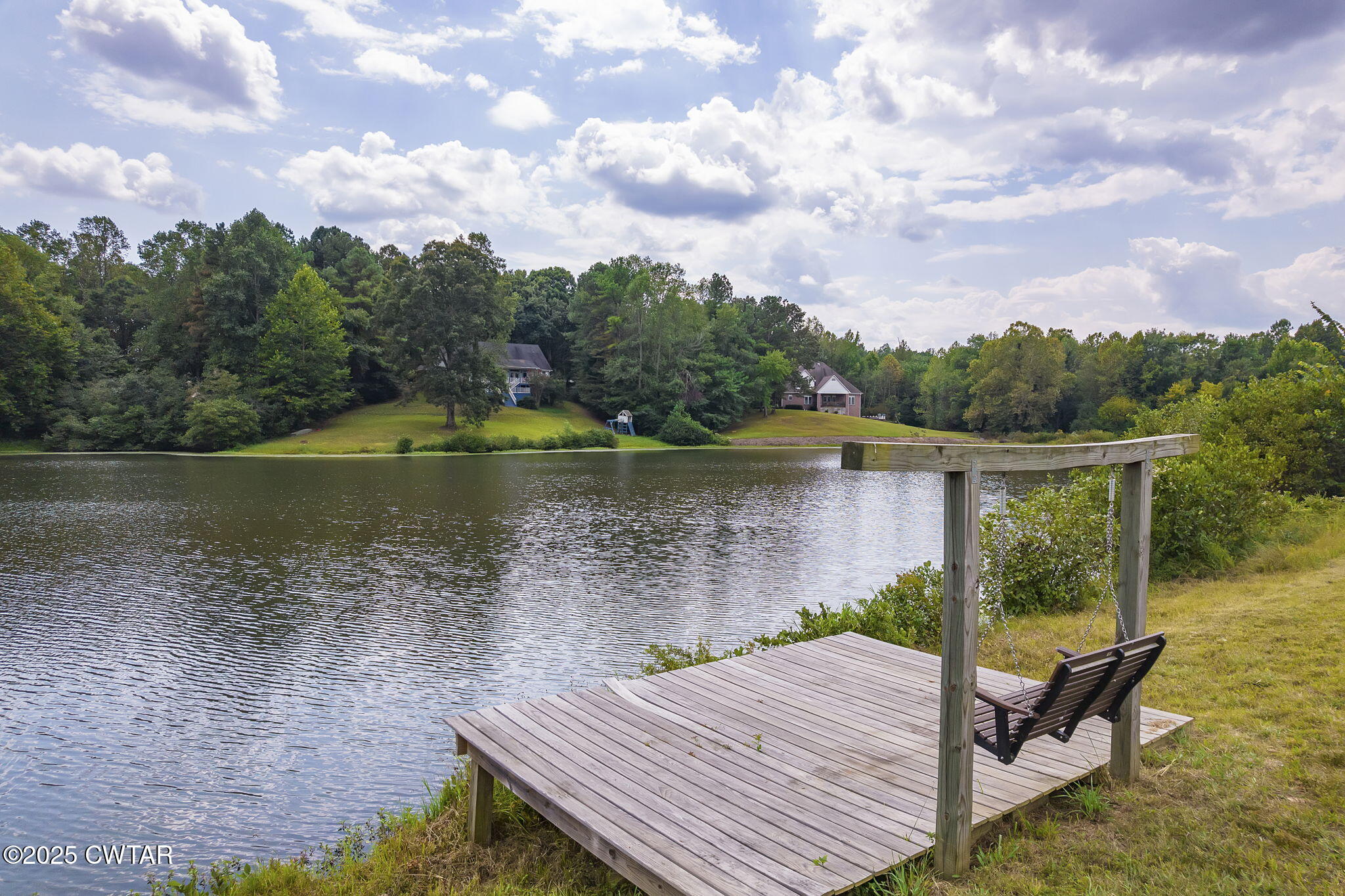 413 Law Lane Lexington, TN 38351 - Photo 15 of 25 a view of a lake with a mountain view