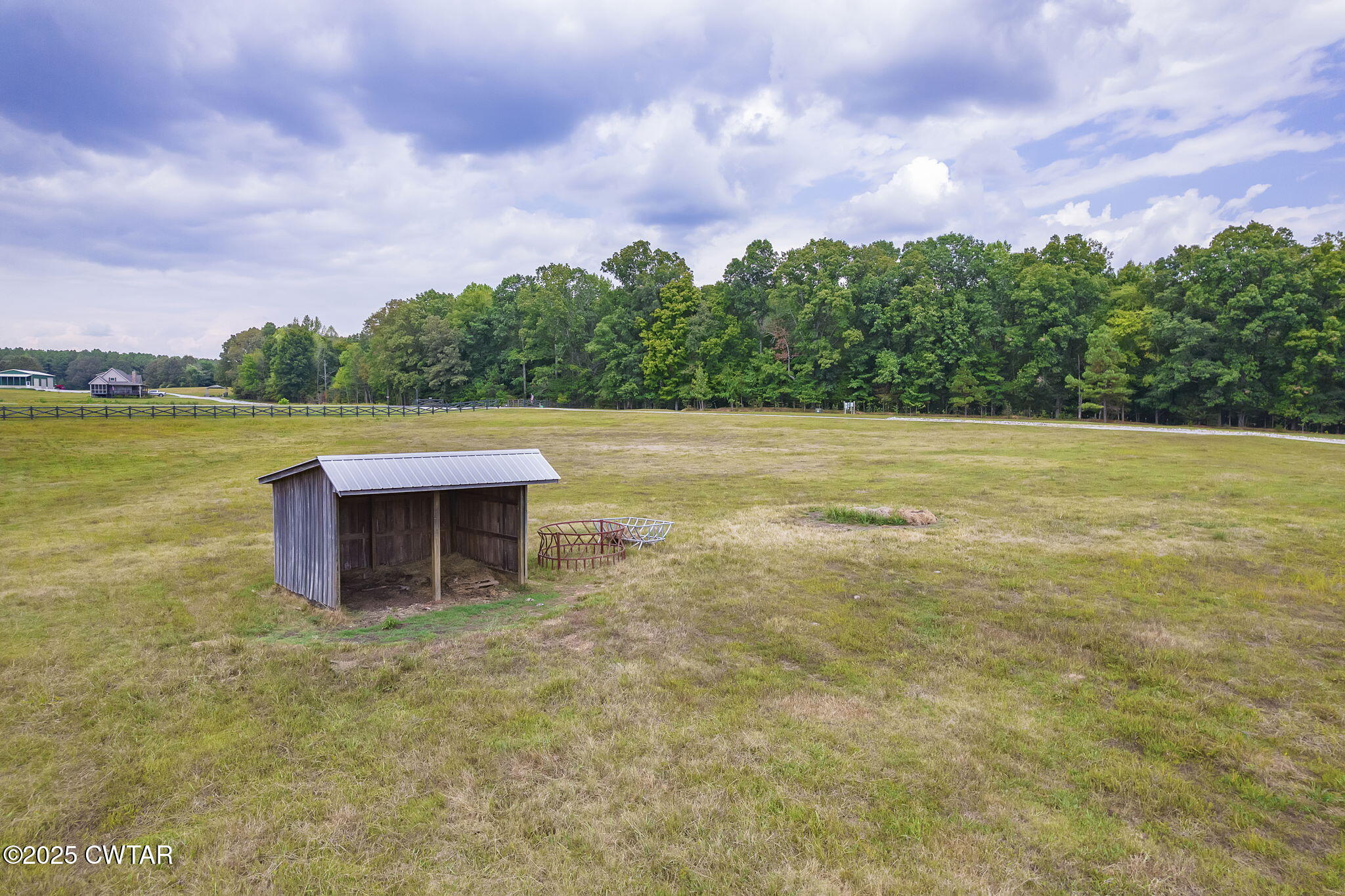 413 Law Lane Lexington, TN 38351 - Photo 17 of 25 a view of a lake with houses in the back