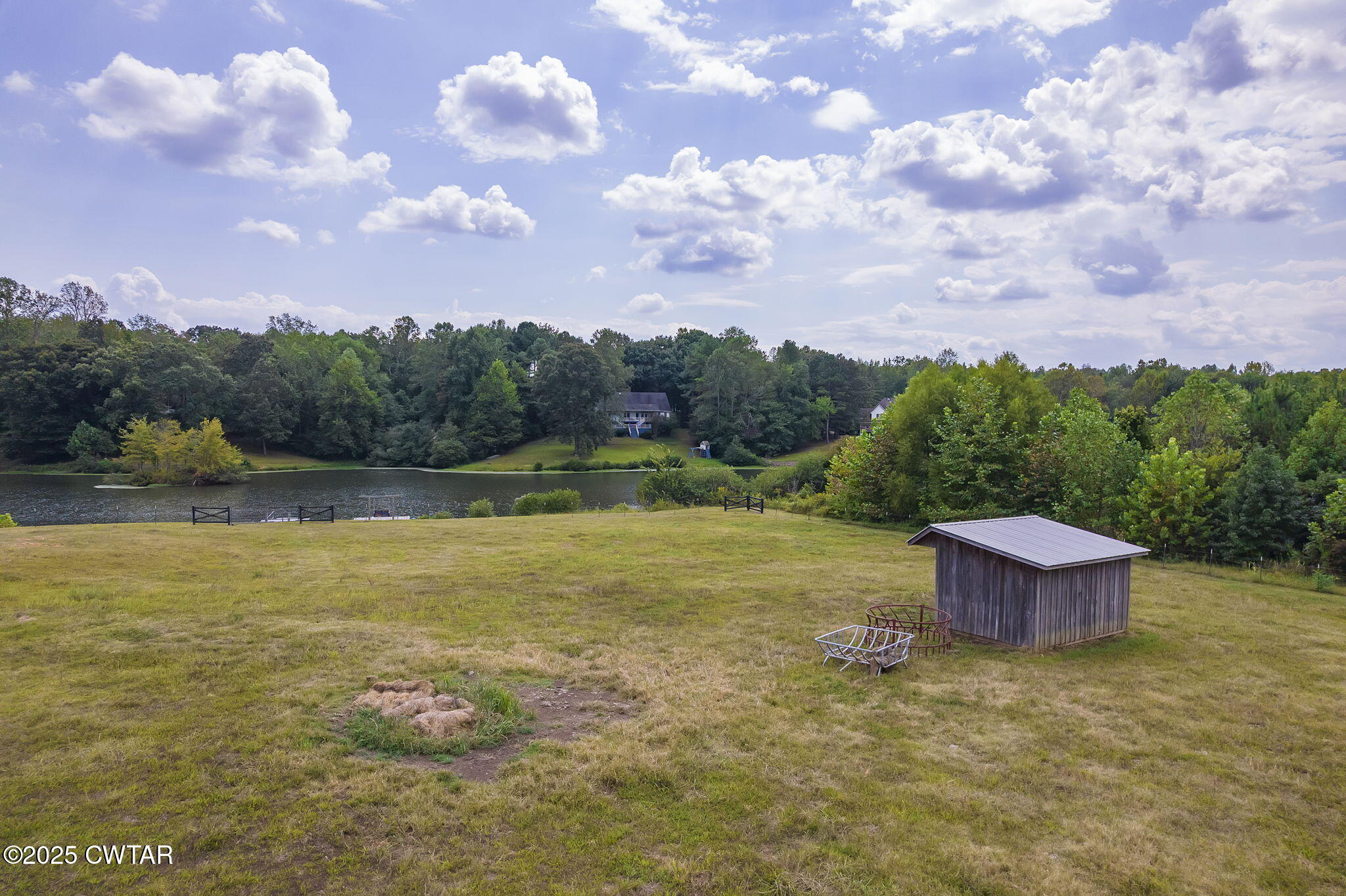 413 Law Lane Lexington, TN 38351 - Photo 18 of 25 a view of a lake with a yard