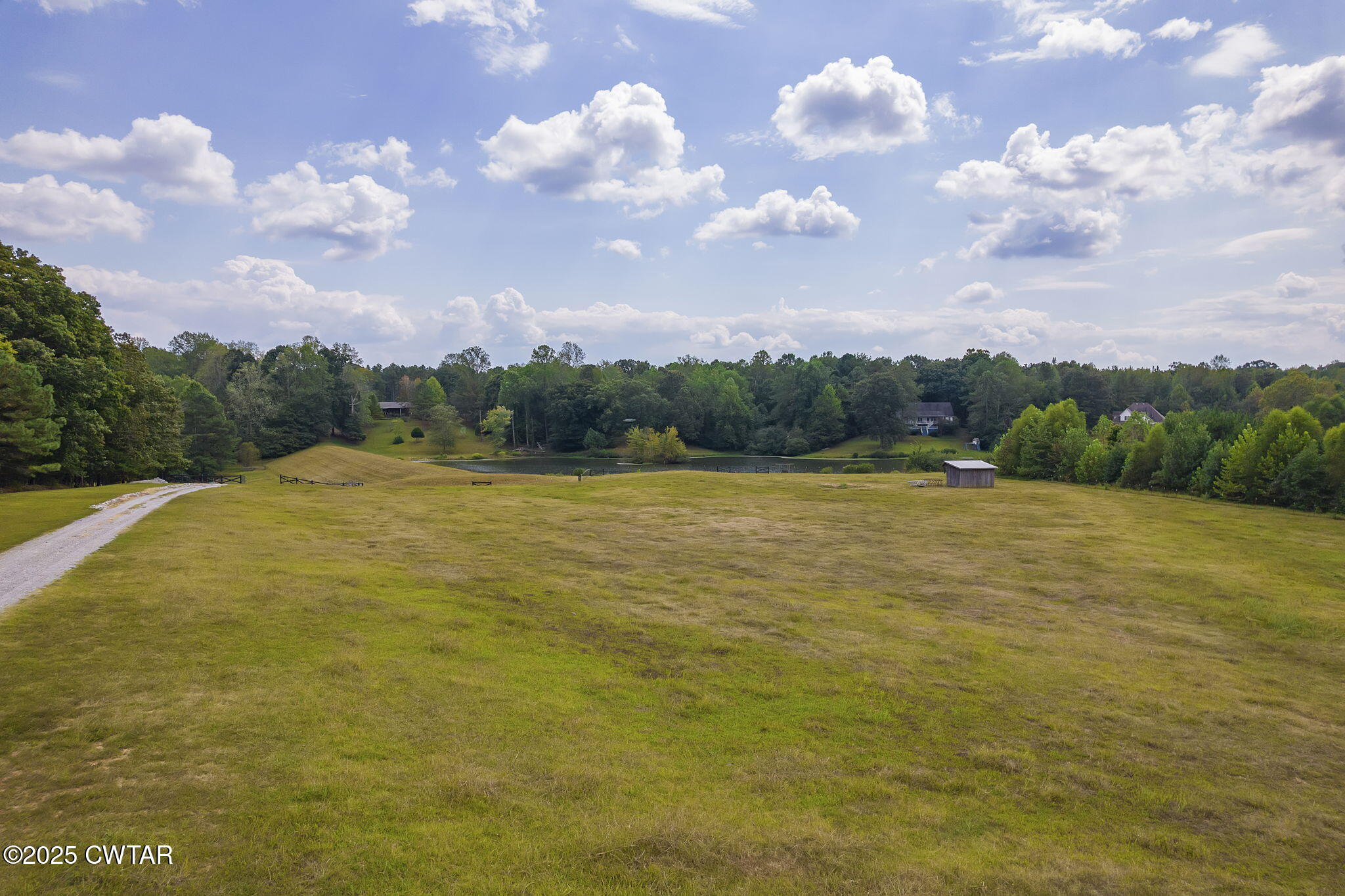 413 Law Lane Lexington, TN 38351 - Photo 19 of 25 a view of a lake and mountain